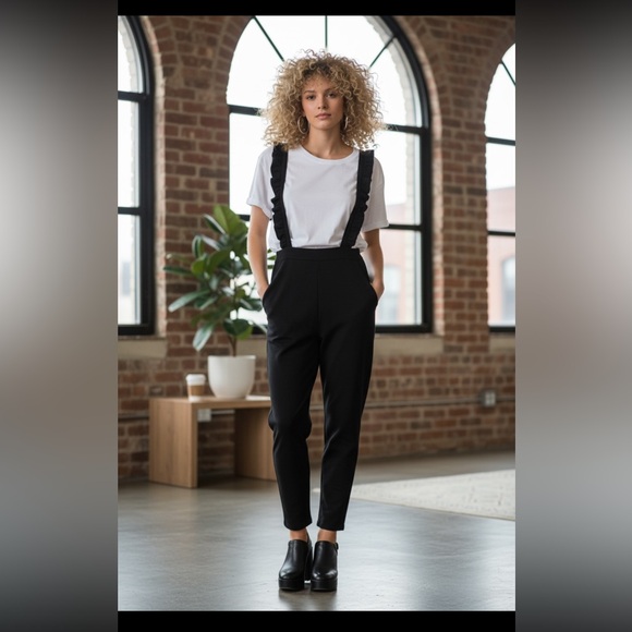 Black Women's Jumpsuit shown with top underneath ( sold separately) - Picture 2 of 11